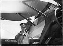 Air Commodore Croil explaining controls of Atlas to Minister of National Defence 27 July 1935