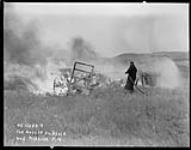 Fog nozzle on shack and rubbish pile ca. 1942