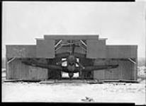 Curtiss Kittyhawk aircraft of the R.C.A.F. in hangar 30 Mar. 1943