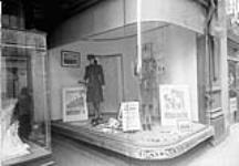 Devlin's window display of uniforms of the R.C.A.F. Women's Division, Sparks Street, Ottawa, Ontario, Canada, 8 April 1943 Apri1 8, 1943.
