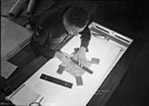 Processing of prints for tri-metrogon mapping 1 Mar. 1945