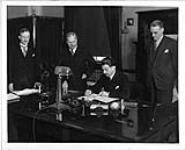 Signing of Money Order Agreement between Canada and France (including Algeria), in the Postmaster General's Office at Ottawa, Ont 17th of Apr., 1935
