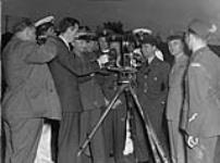 Polish Air Force officers see the workings of a 35mm Movie Camera with Roy Tash n.d.