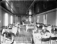 The dining room of Monteith House, Rosseau, Ont., c. 1904 ca. 1904