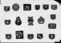 Sample clothing, badges 9 Nov. 1951