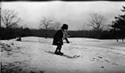 Young girl going downhill on skis [Toronto, Ont.], 24 February, 1917 February 24, 1917.