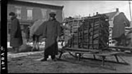 French boy at wood market in Ottawa, [Ont.] 21 Feb., 1918