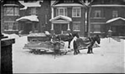 Garbage men with a wagon and sleigh 9 Feb. 1918