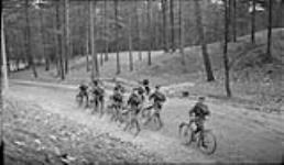 Cyclists on a road 12 Apr. 1916