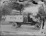 Truck decorated for parade, advertising Neal's Aloafa Bread n.d.