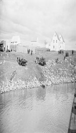 View of Fort Providence from the DISTRIBUTOR, one of the three Hudson's Bay Company paddle steamers on the Mackenzie River Aug. 1937