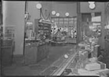Interior of Joseph Cote Ltd., d'Youville Square, [Quebec, P.Q.], 21 Dec., 1948 21 Dec. 1948