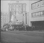 Crowd at the Victoria Theatre to see "Joan of Arc", [Quebec, P.Q.], 6 Feb., 1949 6 Feb. 1949