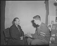 Gabouski and McInery [during an interview for the] St. Patrick's Patrician Herald, [Quebec, P.Q.], 6 Dec., 1949 6 Dec. 1949