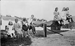 [Children on a see-saw], 1922 1922.