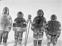 [Inuit men visitng L.T. Burwash's camp at Magnetic Pole Point] Original title: Native visitors to our camp, Magnetic Pole [Point] April 1929.
