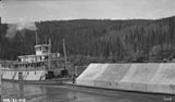 Steamer "Dawson" with barge on Yukon River 1922
