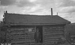 Victor Grant and his cabin at Keno 1922