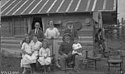 Dr. Lachapelle and family, Mr. Deslaurier and family, Mr. McDougal at the Doctor's farm 1922