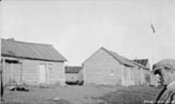 [Houses belonging to Dene community members at Fort Simpson] Original title: Indian shacks at [Fort] Simpson 1929