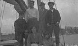 L.A. Giroux, Patsy Klengenberg, his two brothers, his wife and child on his schooner 1929
