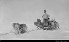 Richard Finnie is an exponent of sunbathing on the Arctic Trail April 1931.