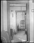 Interior view of Research Station looking south from living room through kitchen to office 1931