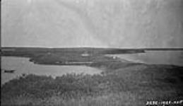 Location of Hudson's Bay Trading Post at Kittigazuit seen from neck of peninsula to the North July 1927