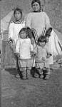 [Inuit women and children] Original title: Group of native women and children 11 September 1935.