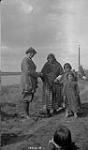 [Mrs. Marian G. Ellis with Gwich'in woman and children] Original title: Mrs. Marian G. Ellis and Indian woman and children 1922