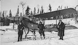 W.L. Brintnell [left] early [nineteen] thirties. Christmas Shipment to North. DH-60X 'Moth' aircraft G-GIAG n.d.