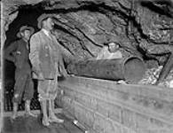 Cheechaco tunnel and sluice. Flashlight 1910