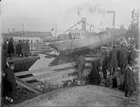 Government dry dock. Launching a concrete Ship, Nov. 14, 1917