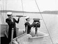 Signallers aboard H.M.C.S. OTTAWA, Botwood, Newfoundland, 22 June 1940 June 22, 1940.