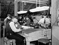 Winding Section of the Electrical Artificers' Workshop, H.M.C. Dockyard, Halifax, Nova Scotia, Canada, 13 November 1942 November 13, 1942.