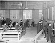 Ratings doing various types of metalwork at the Mechanical Training Establishment, H.M.C.S. CORNWALLIS, Halifax, Nova Scotia, Canada, 18 January 1943 January 18, 1943.