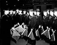 Cadets of the Nelson Sea Cadet Corps learning signalling with semaphore flags, Halifax, Nova Scotia, Canada, 23 March 1943 March 23, 1943.