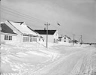 Street scene at Aklavik, N.W.T., March 1956 March 1956.