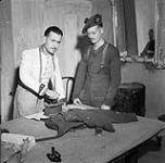 Leo Burattini pressing the uniform of Private D.S. McKinnel of the Seaforth Highlanders of Canada at the Monastery Inn, a Salvation Army rest centre for the 2nd Canadian Infantry Brigade. Ortona, Italy, 14 February 1944 February 14, 1944