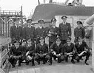 Officers of the destroyer H.M.C.S. ASSINIBOINE, which sank the German submarine U-210 on 6 August 1942, St. John's, Newfoundland, 10 August 1942 August 10, 1942.