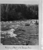 Running a rapid on the Sturgeon River, [Nipissing District, Ont., 1897] 1897