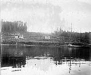 A settler's house and clearing on the Sturgeon [River, Nipissing District, Ontario.] [1897]