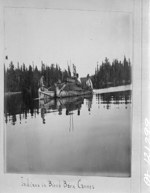 Indians in birch bark canoes, [possible Lake Timiskaming, Ont., 1897] 1897