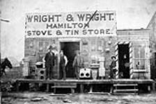 Corner 8th Street & Rosser Ave. 1882, (Brandon, N.W.T. - Wright & Wright Hamilton Stove & Tin Store) 1882