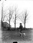 Mr. Ferguson and dog December 1896.