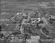 Aerial view of [Central Experimental Farm] showing water tower and adjacent buildings [Ottawa, Ontario] 8 Ot. 1963