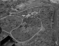 Aerial view [Central Experimental Farm, Ottawa, Ontario] showing Arboretum lookout and Plant Research Buildings Oct. 1963