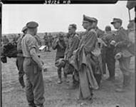 Nazi prisoners interrogated while awaiting transport 23 Aug. 1944