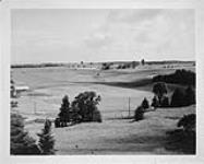 General view showing the rolling topography of the Experimental Farm July 1963