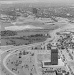 Aerial view looking east along the Ottawa River Parkway at Tunney's Pasture 20 June 1970